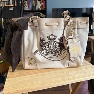 Juicy Couture Beige and Brown Canvas Tote with Crest Charm